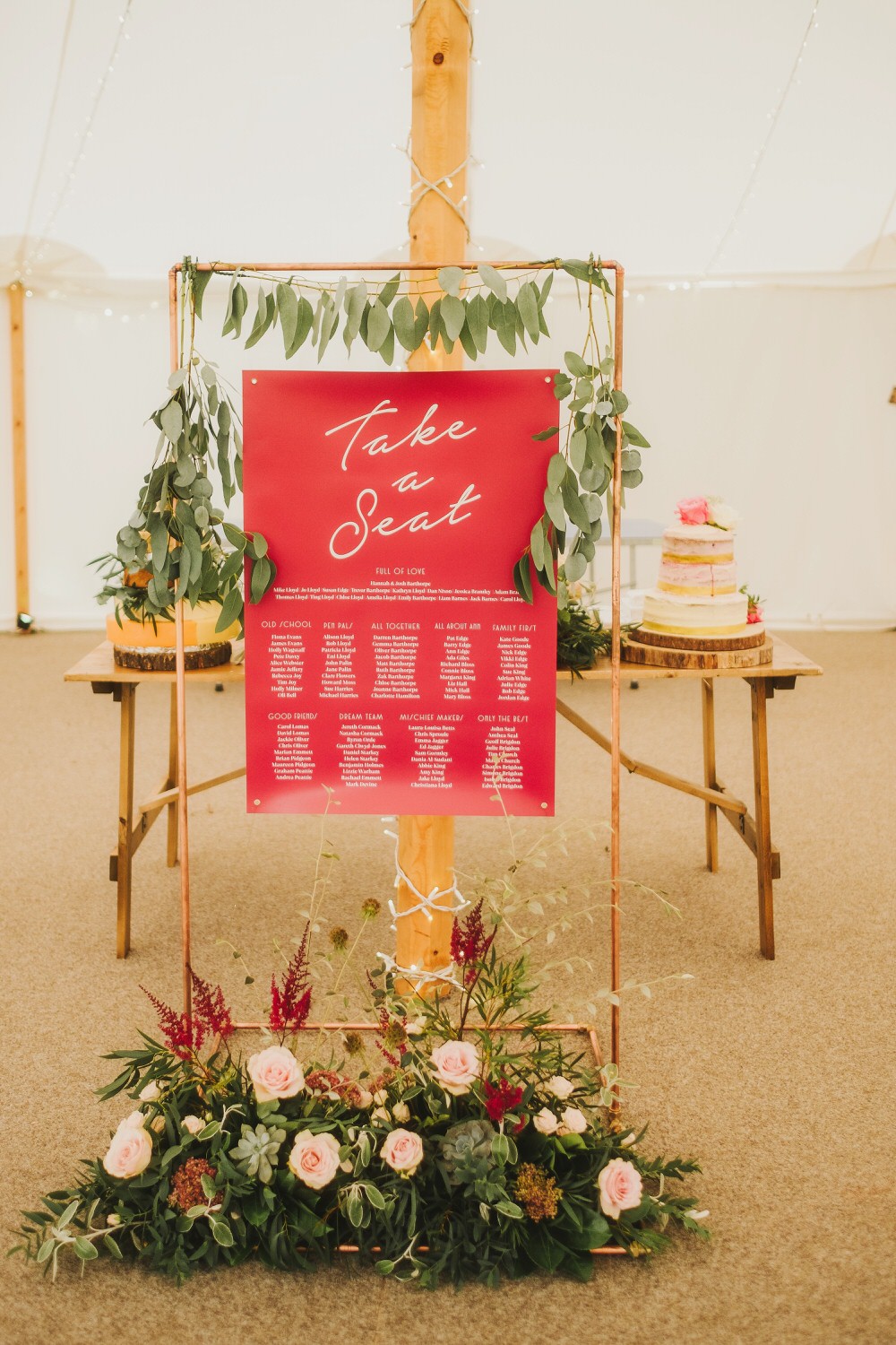 Seating Plan Table Chart Arch Backdrop Flowers Rose Astilbe Greenery Foliage Dorfold Hall Wedding Kate McCarthy Photography