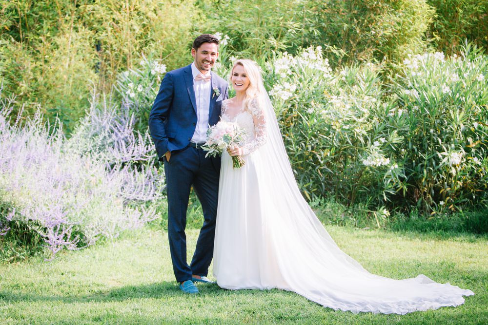 Bride Bridal Long Sleeve Lace Dress Train Navy Blue Suit Groom Pink Bow Tie Bouquet Saint Tropez Wedding Sophie Boulet Photographe
