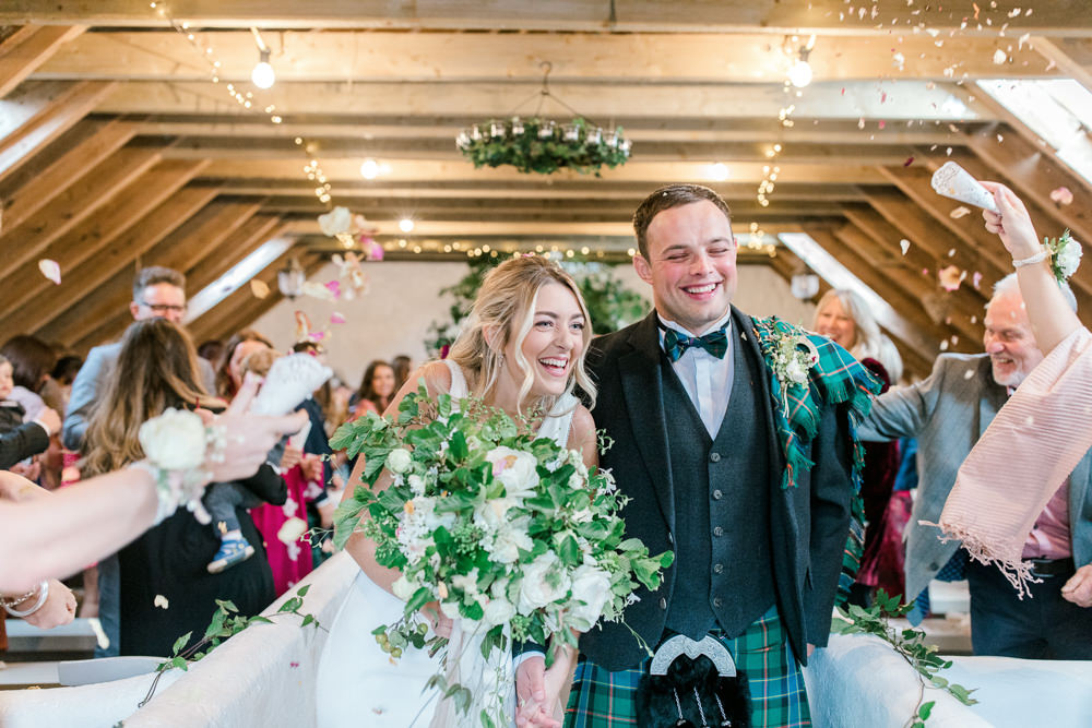 Bride Bridal Deep V Plunge Neckline Dress Sleeveless Slim Fit Ogilvie Tartan Kilt Groom Veil Foliage Bouquet Tin Shed Knockraich Farm Wedding The Gibsons Photography