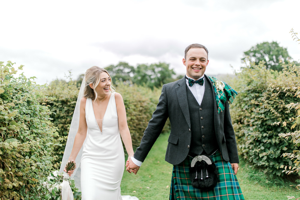 Bride Bridal Deep V Plunge Neckline Dress Sleeveless Slim Fit Ogilvie Tartan Kilt Groom Veil Tin Shed Knockraich Farm Wedding The Gibsons Photography