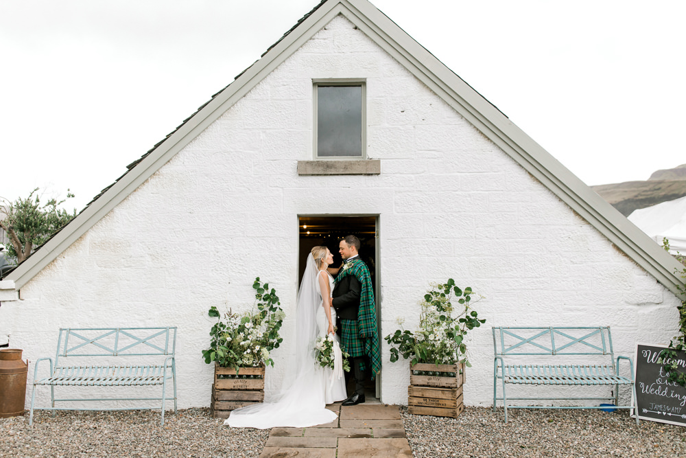 Bride Bridal Deep V Plunge Neckline Dress Sleeveless Slim Fit Ogilvie Tartan Kilt Groom Veil Tin Shed Knockraich Farm Wedding The Gibsons Photography
