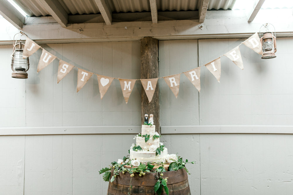 Just Married Bunting Cake Buttercream Barrel Greenery Foliage Tin Shed Knockraich Farm Wedding The Gibsons Photography