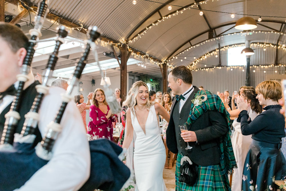 Bride Bridal Deep V Plunge Neckline Dress Sleeveless Slim Fit Ogilvie Tartan Kilt Groom Veil Tin Shed Knockraich Farm Wedding The Gibsons Photography