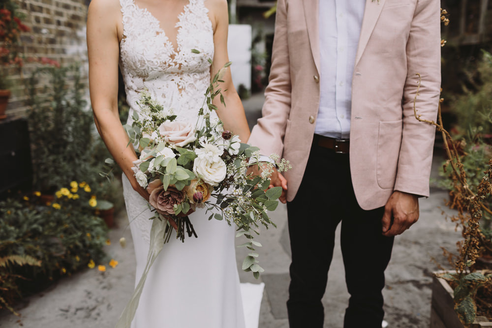 Bride Bridal Sleeveless V Neck Fit and Flare Train Pronovias Dress Gown Pink Jacket Reiss Groom Wild Bouquet Loose Handtied Rose Tram House Wedding Luke Hayden Photography