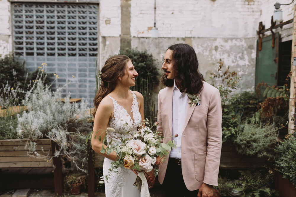 Bride Bridal Sleeveless V Neck Fit and Flare Train Pronovias Dress Gown Pink Jacket Reiss Groom Wild Bouquet Loose Handtied Rose Tram House Wedding Luke Hayden Photography