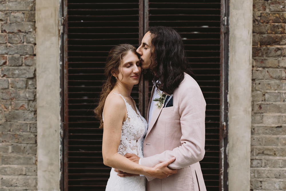 Bride Bridal Sleeveless V Neck Fit and Flare Train Pronovias Dress Gown Pink Jacket Reiss Groom Tram House Wedding Luke Hayden Photography