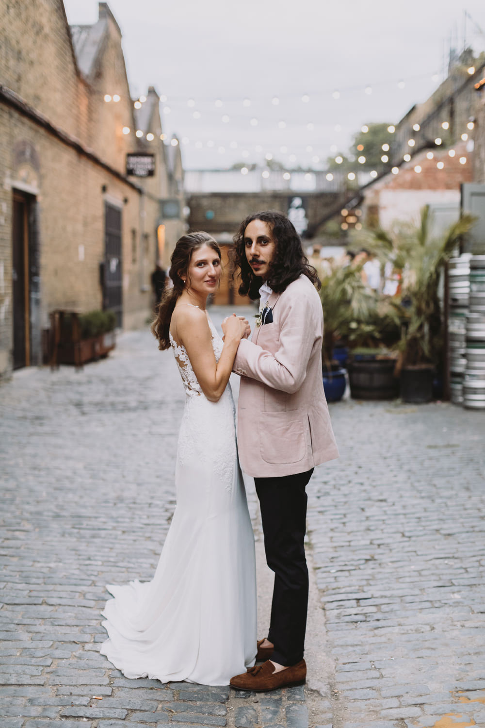Bride Bridal Sleeveless V Neck Fit and Flare Train Pronovias Dress Gown Pink Jacket Reiss Groom Tram House Wedding Luke Hayden Photography