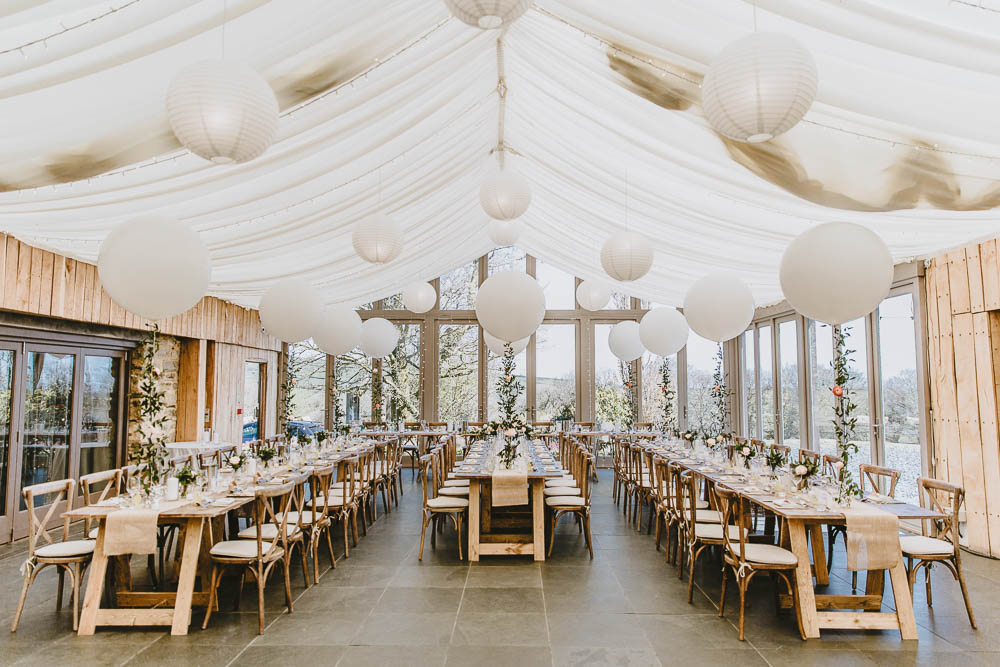 Long Table Decor Giant Balloons Greenery Foliage Hessian Burlap Lanterns Trevenna Barns Wedding Wild Tide Creative