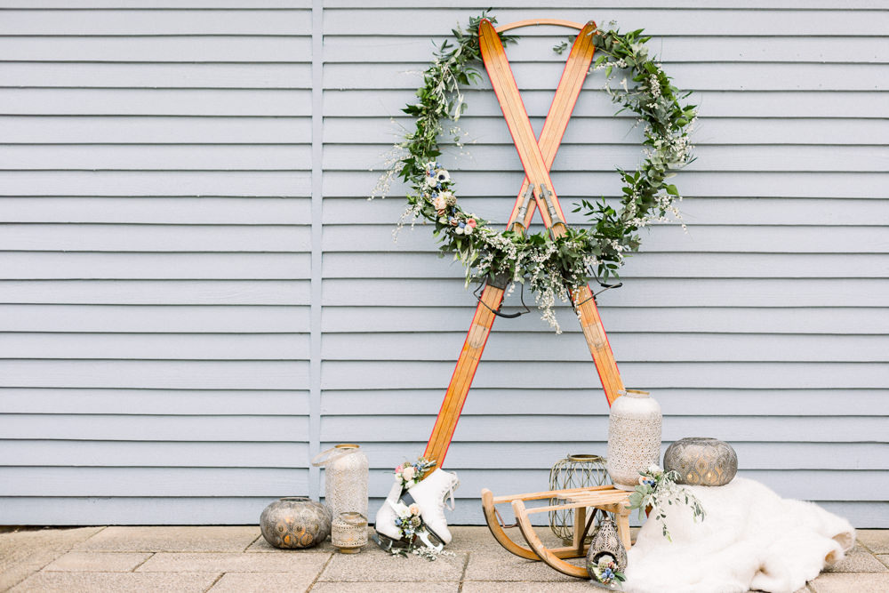 Wreath Hoop Greenery Sledge Ice Skates Flowers Winter Blue Barn Wedding Ideas Joanna Briggs Photography