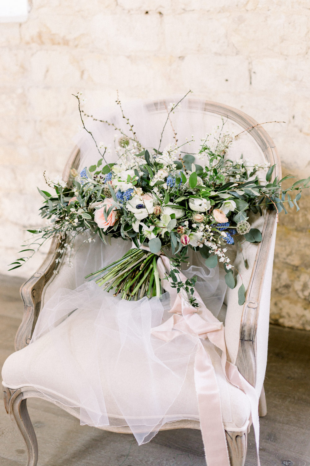 Bouquet Flowers Bride Bridal Grape Hyacinth Anemone Greenery Folliage Nigella Seeds Scabious Blossom Winter Blue Barn Wedding Ideas Joanna Briggs Photography