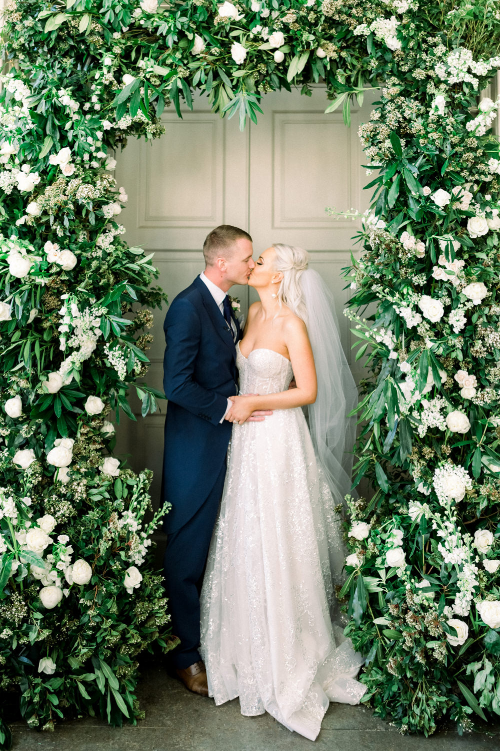 Bride Bridal Berta Princess Sparkly Dress Gown Veil Navy Tailcoat Groom Sweetheart Floral Arch Aynhoe Park Wedding Sanshine Photography
