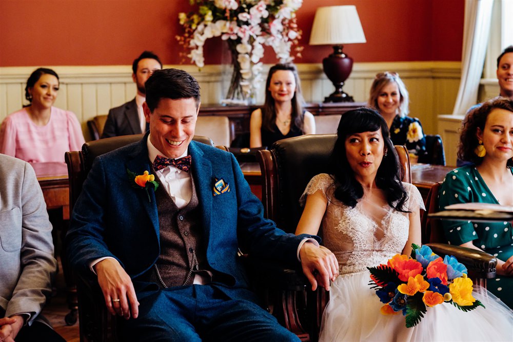 Bride Bridal Divine Atelier Dress Gown Tulle Skirt Lace Top Cap Sleeve Three Piece Suit Groom Multicoloured Paper Flower Bouquet Brighton Town Hall Wedding Marianne Chua Photography