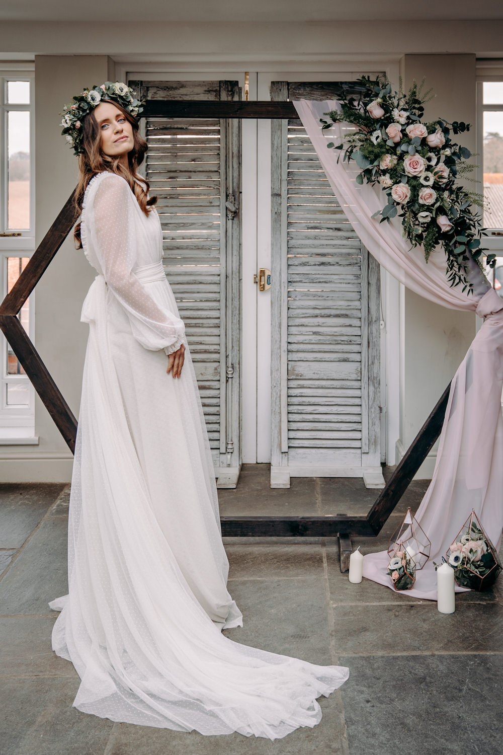 Hexagon Backdrop Flowers Installation Moongate Arch Bride Bridal Dress Gown Kula Tsurdiu Tulle Long Sleeves Train Free Spirited Wedding Ideas EKR Pictures