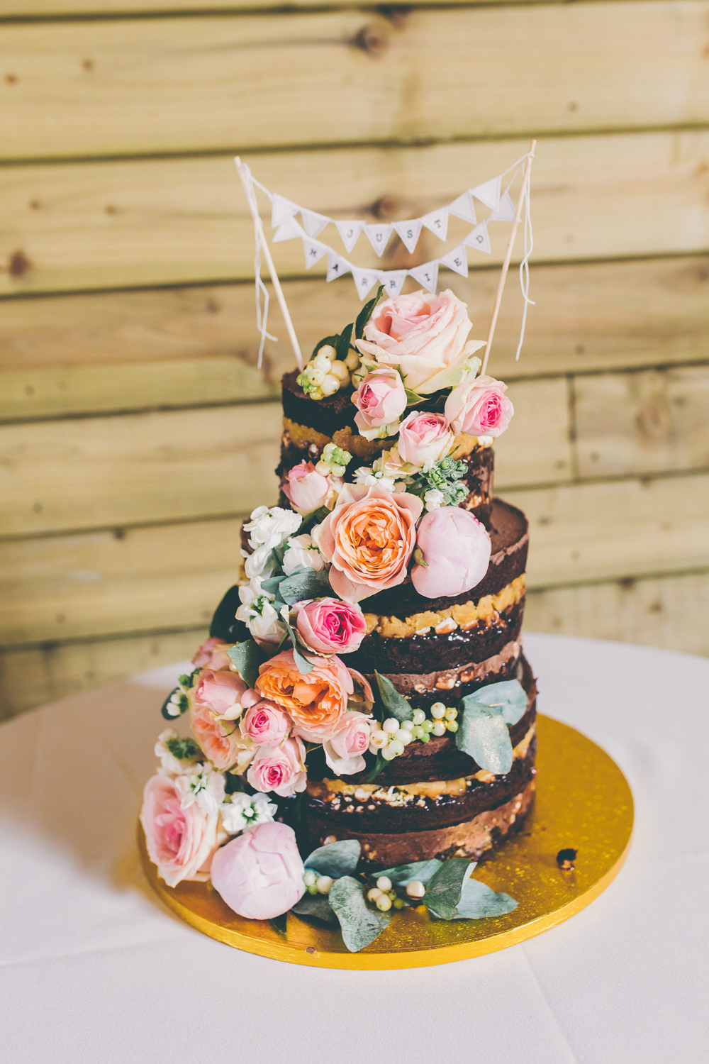 Naked Cake Chocolate Sponge Layer Flowers Floral Bunting Topper High Billinghurst Farm Wedding Larissa Joice Photography