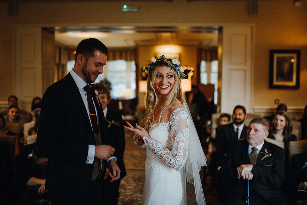 Bride Bridal Sweetheart Neckline Lace Long Sleeve Flower Crown Three Piece Suit Tweed Waistcoat Groom Inn on the Lake Wedding Leah Lombardi Weddings
