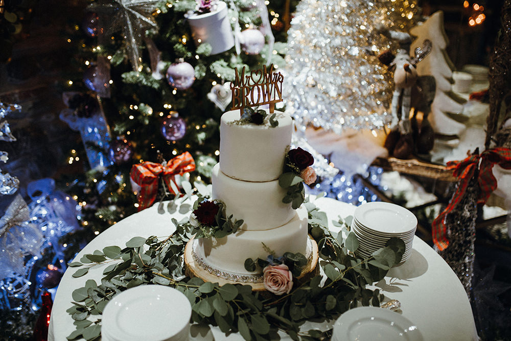 White Tiered Cake Wooden Topper Eucalyptus Inn on the Lake Wedding Leah Lombardi Weddings