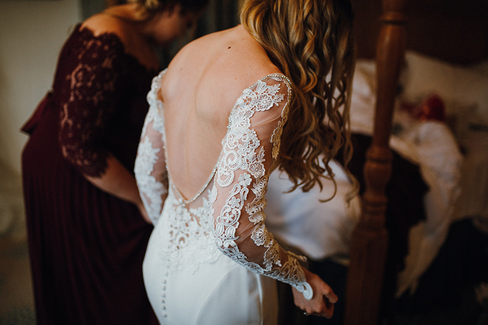 Bride Bridal Backless Lace Button Back Dress Gown Long Sleeves Inn on the Lake Wedding Leah Lombardi Weddings