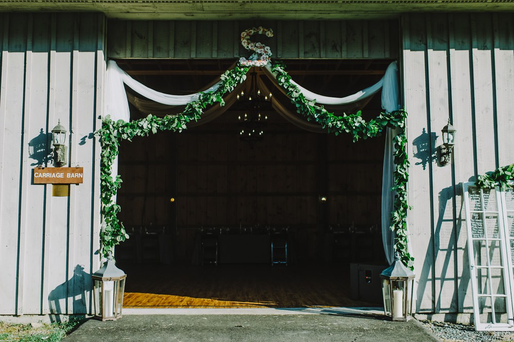 Barn Door Greenery Drapes Maryland Wedding L. Hewitt Photography
