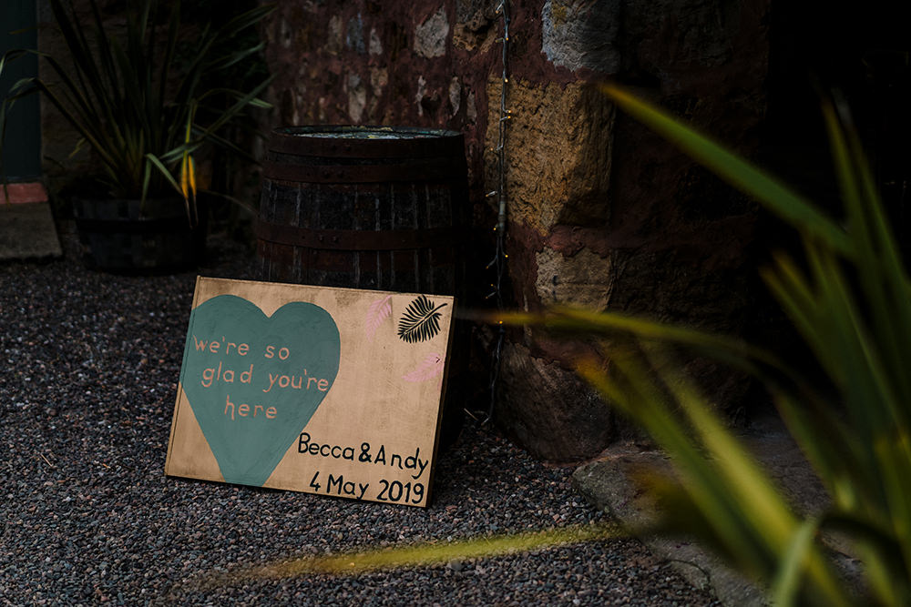 We're So Glad You're Here Welcome Sign Tropical Luxe Wedding Burfly Photography