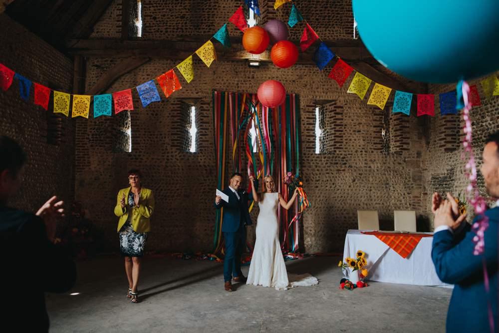 Bride Bridal Pronovias Dress Gown Boat Neck Fitted Navy Suit Groom Mexican Multicoloured Decor Waxham Great Barn Wedding Joshua Patrick Photography
