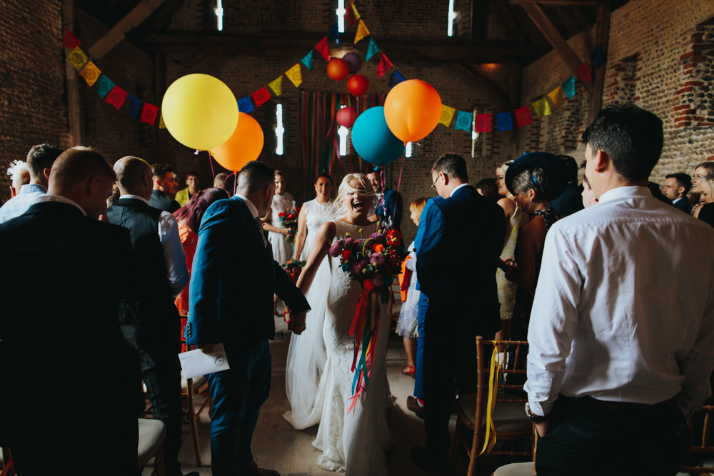 Bride Bridal Pronovias Dress Gown Boat Neck Fitted Navy Suit Groom Colourful Multicoloured Balloon Waxham Great Barn Wedding Joshua Patrick Photography