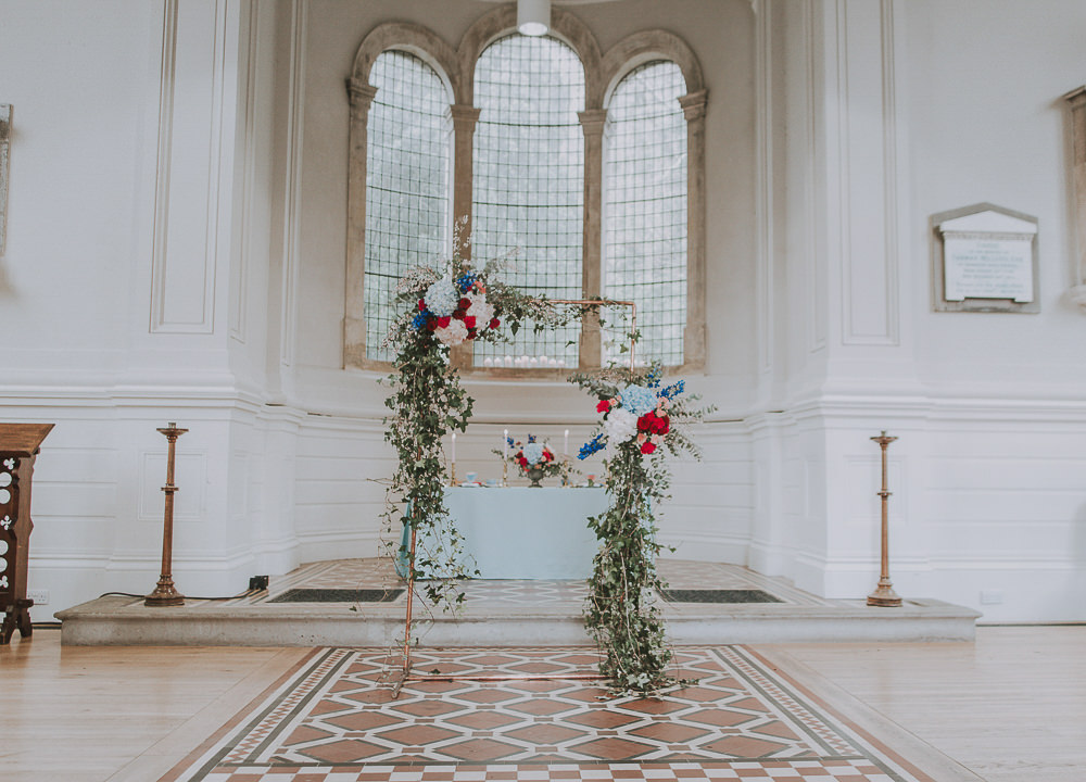 Flower Arch Backdrop Red Pink Blue Greenery Foliage Wes Anderson William Morris Wedding Ideas Jessica Hill Photography