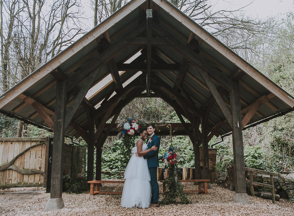 Flower Arch Backdrop Red Pink Blue Greenery Foliage Wes Anderson William Morris Wedding Ideas Jessica Hill Photography