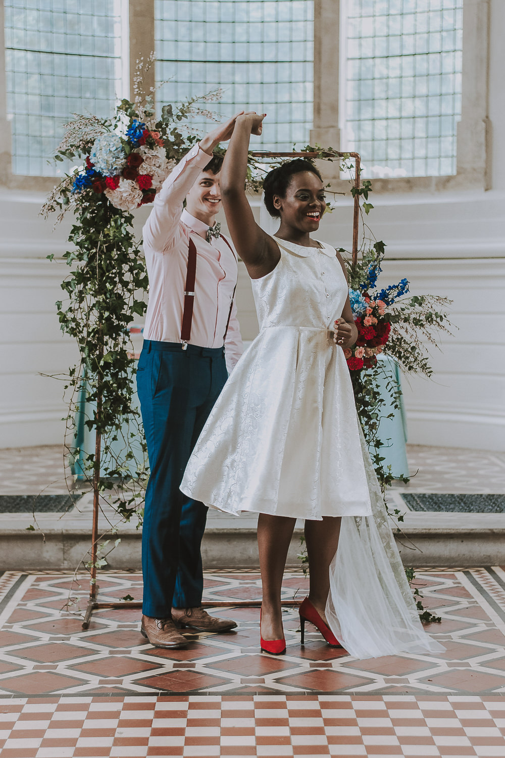 Flower Arch Backdrop Red Pink Blue Greenery Foliage Wes Anderson William Morris Wedding Ideas Jessica Hill Photography