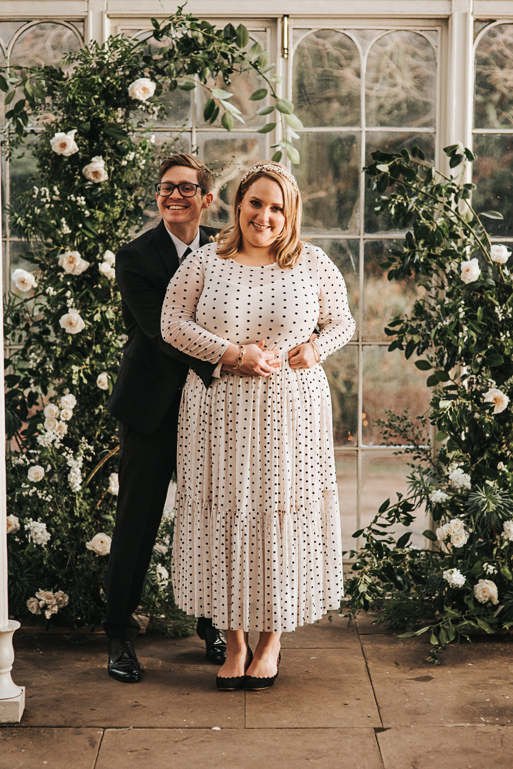 Flower Arch Installation Backdrop Ceremony Aisle Greenery Foliage Rose Wild Natural Wollaton Hall Wedding Pear and Bear Photography