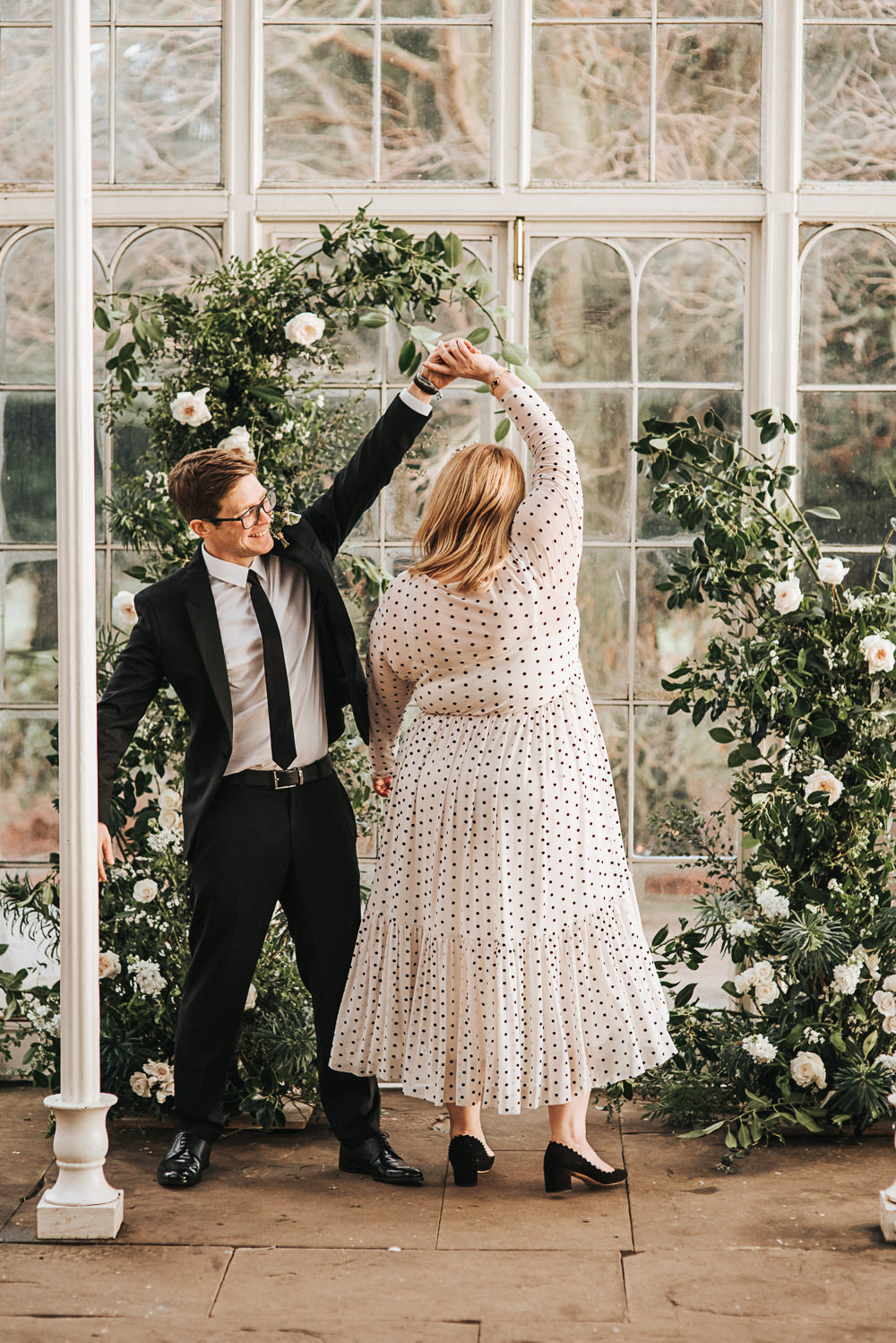 Flower Arch Installation Backdrop Ceremony Aisle Greenery Foliage Rose Wild Natural Wollaton Hall Wedding Pear and Bear Photography