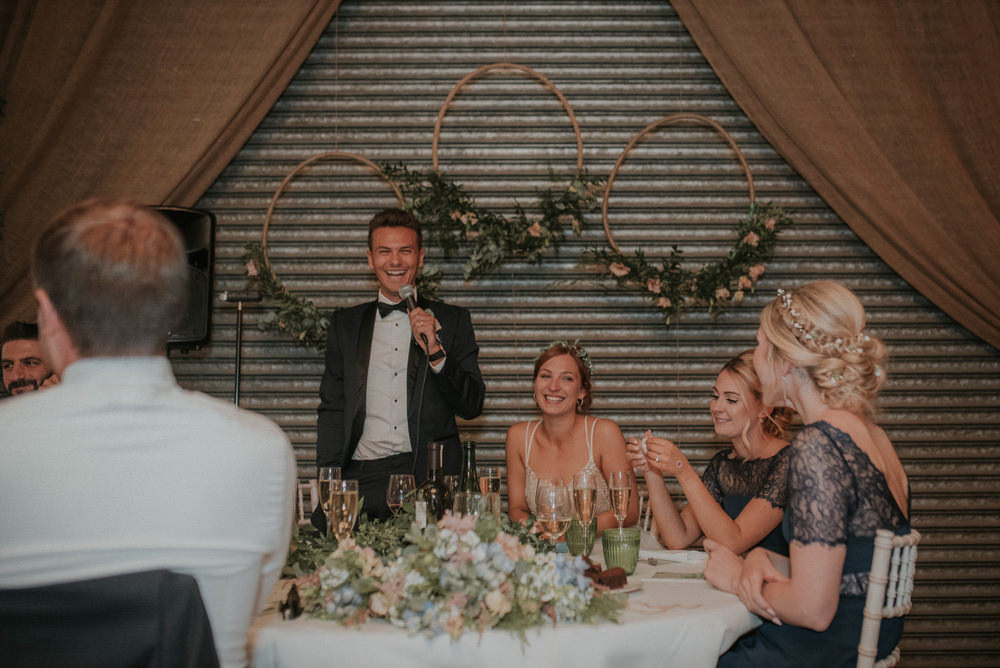 Hanging Hoops Wreaths Foliage Decor Decoration Backdrop Captains Wood Barn Wedding Megan Elle Photography