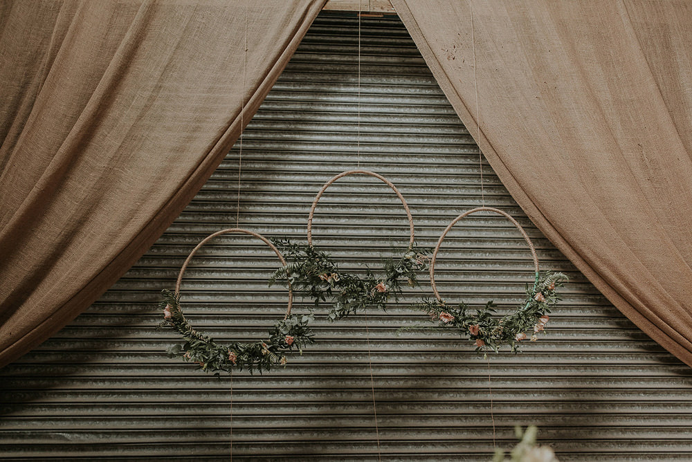 Hanging Hoops Wreaths Foliage Decor Decoration Backdrop Captains Wood Barn Wedding Megan Elle Photography