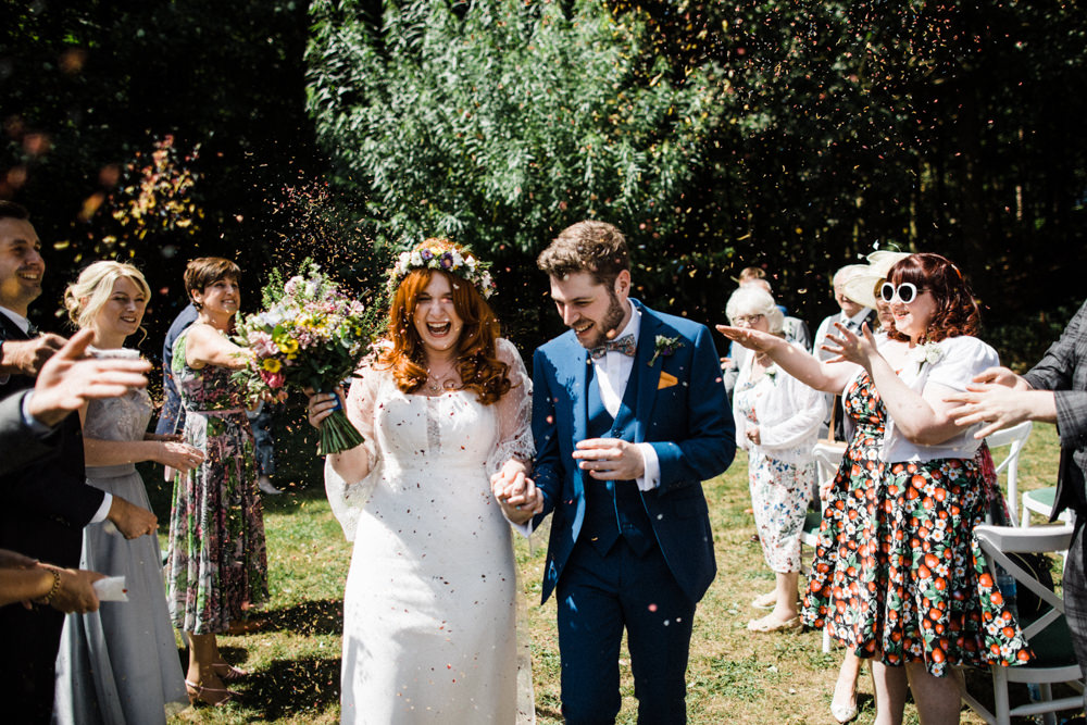 Bride Bridal Boho Cape Wedding Dress Gown Flower Crown Mrs Bow Tie Three Piece Suit Groom Confetti Wildflower Bouquet Chaucer Barn Wedding Through The Woods We Ran