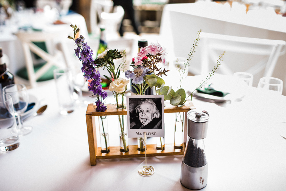 Table Name Polaroid Einstein Physicist Test Tube Holder Flowers Chaucer Barn Wedding Through The Woods We Ran