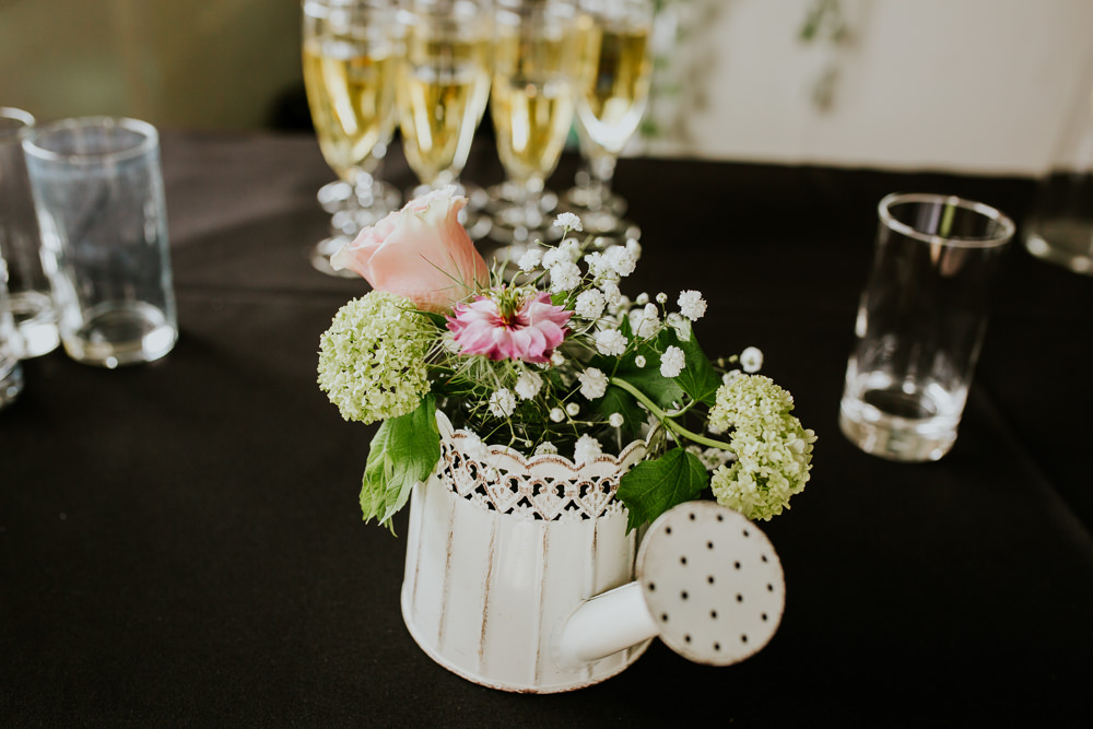 Watering Can Flowers DIY Village Hall Wedding PhotoBart