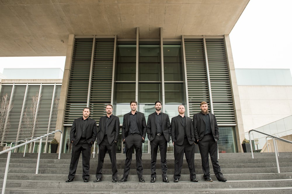 Groom Black Suit Tie Shirt Open Collar Groomsmen Greenhouse Michigan Wedding Jean Smith Photography