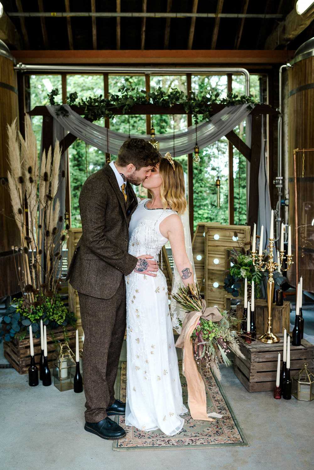 Decor Decoration Backdrop Ceremony Fetoon Lights Edison Lightbulbs Flower Arch Pampas Grass Crates Candles LOVE Letters Indie Wedding Ideas Kat Antos-Lewis Photography