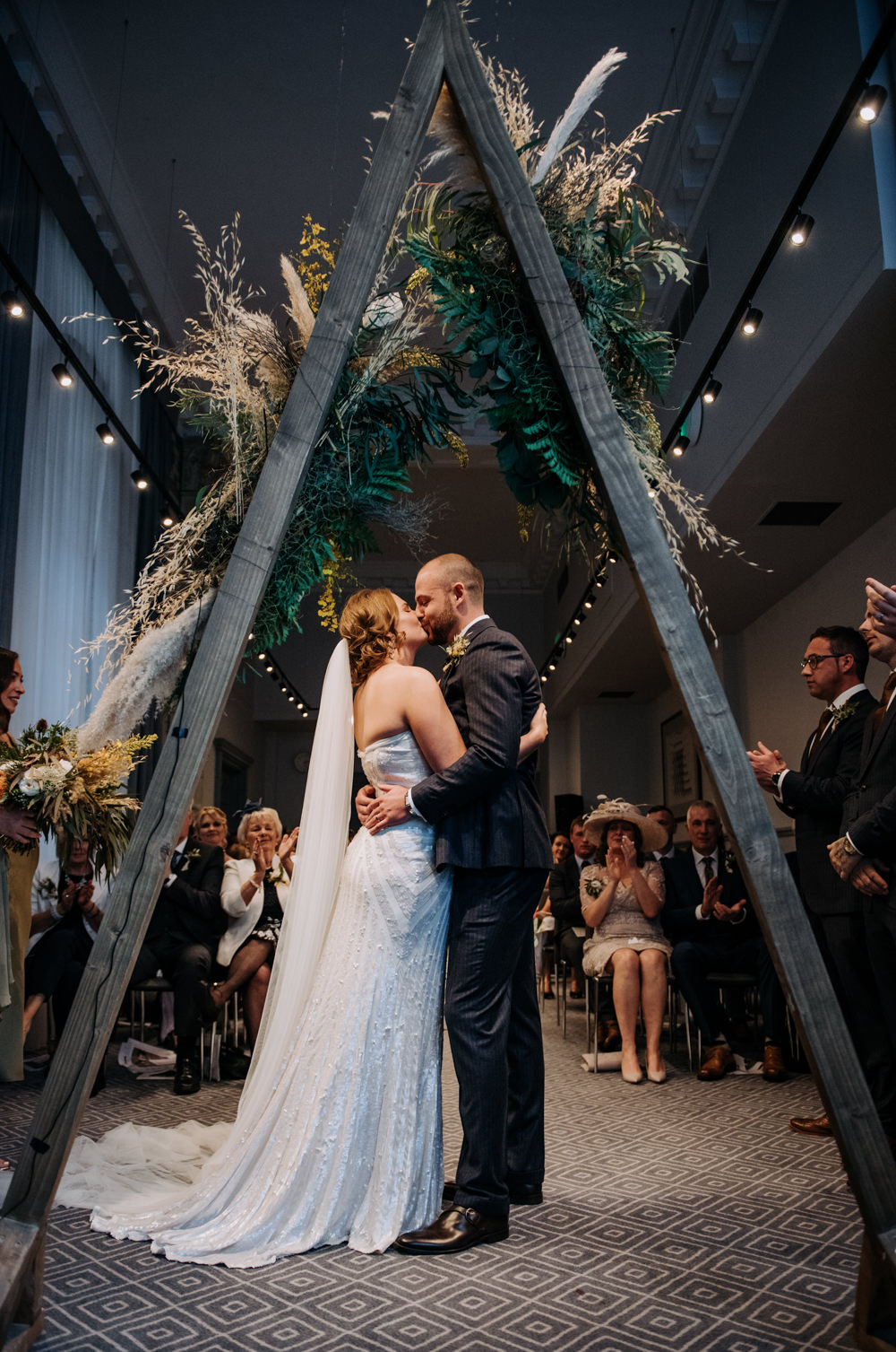 Bride Bridal Strapless Sequin Embellished Dress Gown Train Veil Navy Suit Groom Wildflower Bouquet Triangle Arbour Foliage Manchester Wedding Kazooieloki Photography