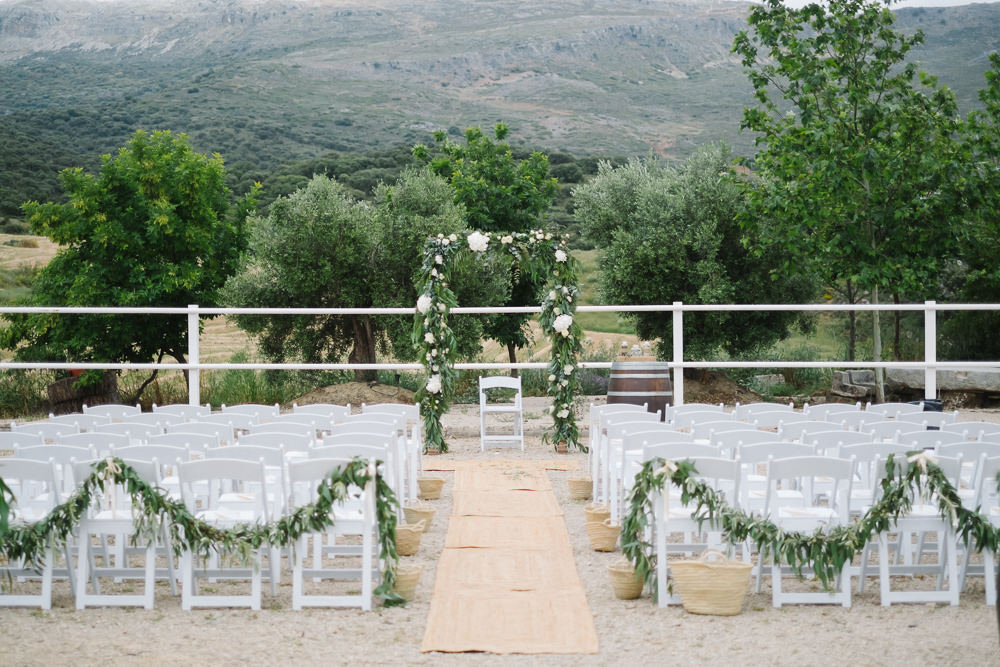 Outdoor Ceremony Aisle Foliage Arch Backdrop Flower Greenery Spain Destination Wedding Jesus Caballero Photography