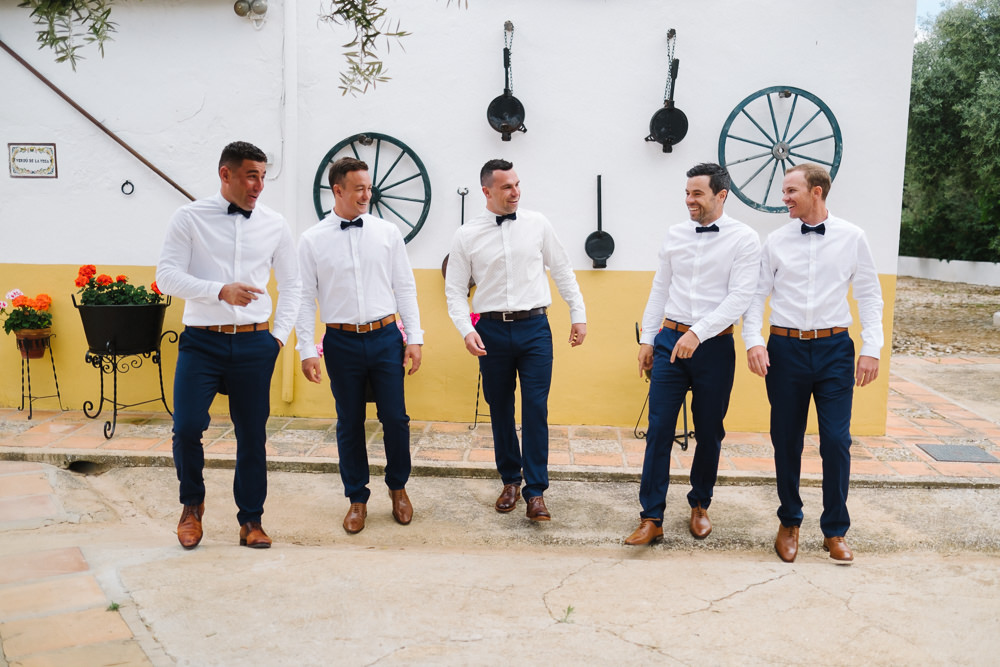 Groom Groomsmen Chinos Shirts Bow Ties Spain Destination Wedding Jesus Caballero Photography