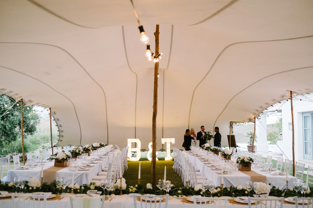 Stretch Tent Marquee Decor Long Tables Letter Lights Festoon Lights Lighting Spain Destination Wedding Jesus Caballero Photography