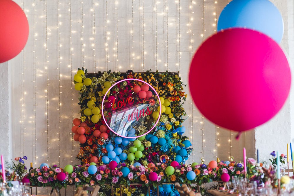 Balloon Wall Backdrop Flowers Multicoloured Rainbow Colourful Neon Sign Decor Decoration Trinity Buoy Wharf Wedding Babb Photo