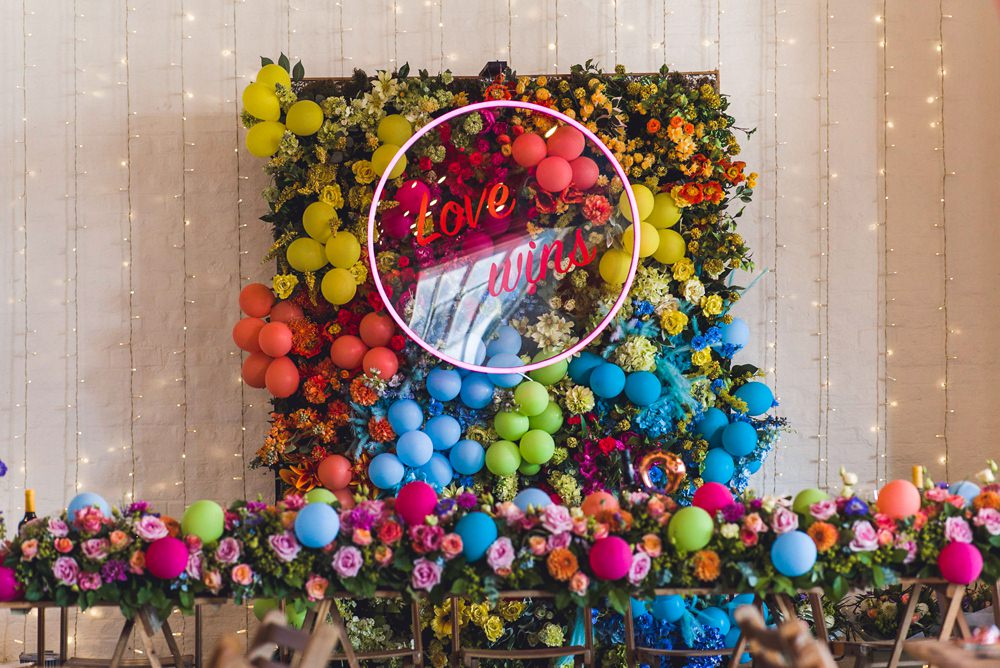 Balloon Wall Backdrop Flowers Multicoloured Rainbow Colourful Neon Sign Decor Decoration Trinity Buoy Wharf Wedding Babb Photo
