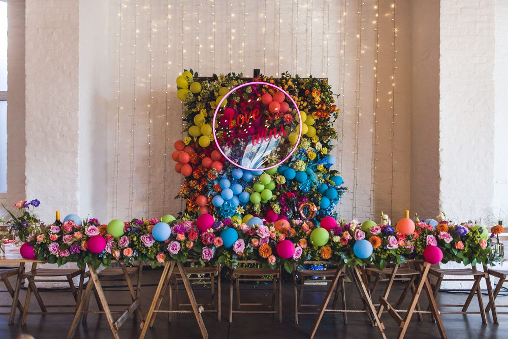 Balloon Wall Backdrop Flowers Multicoloured Rainbow Colourful Neon Sign Decor Decoration Trinity Buoy Wharf Wedding Babb Photo