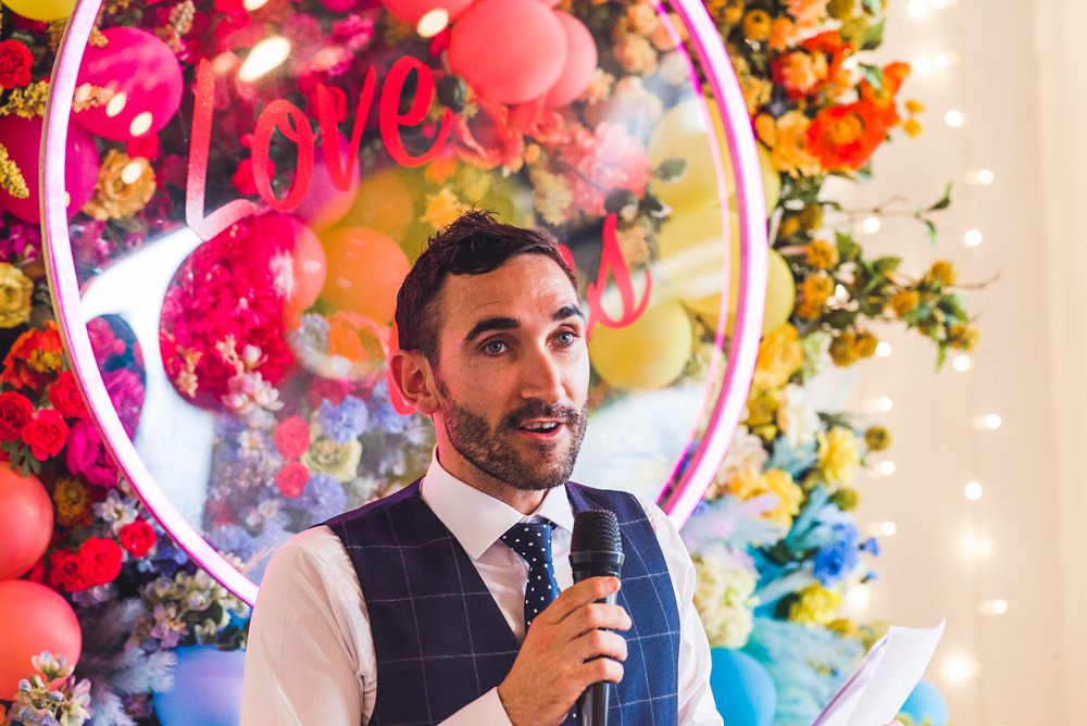 Balloon Wall Backdrop Flowers Multicoloured Rainbow Colourful Neon Sign Decor Decoration Trinity Buoy Wharf Wedding Babb Photo