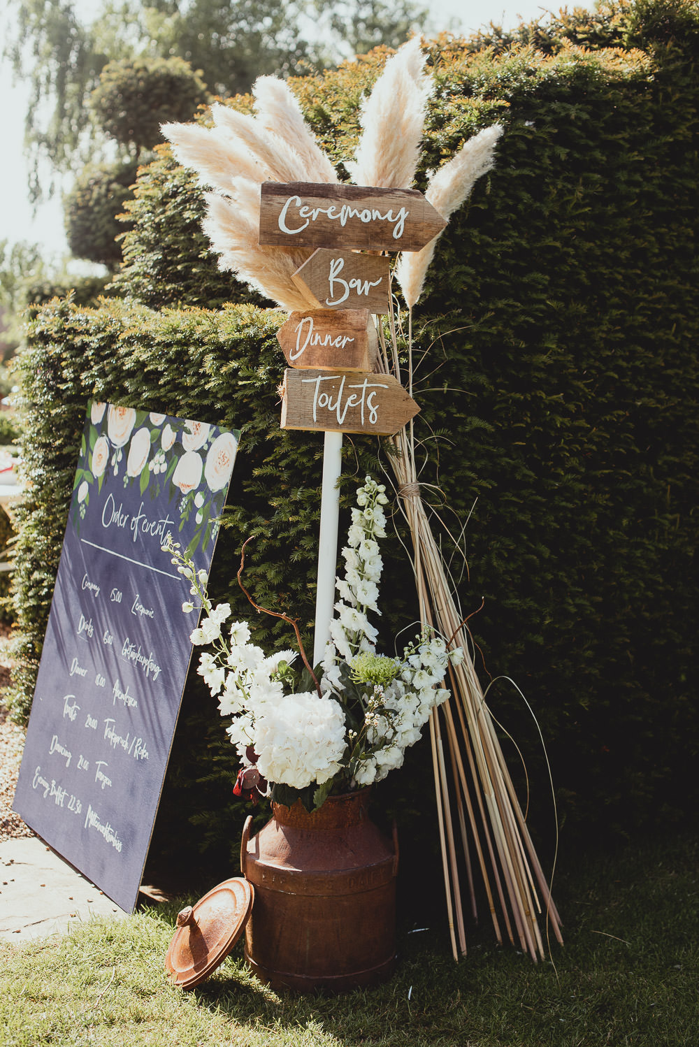 Wooden Sign Post Direction Pampas Grass Order of Day Weekend Long Wedding Georgia Rachael Photography