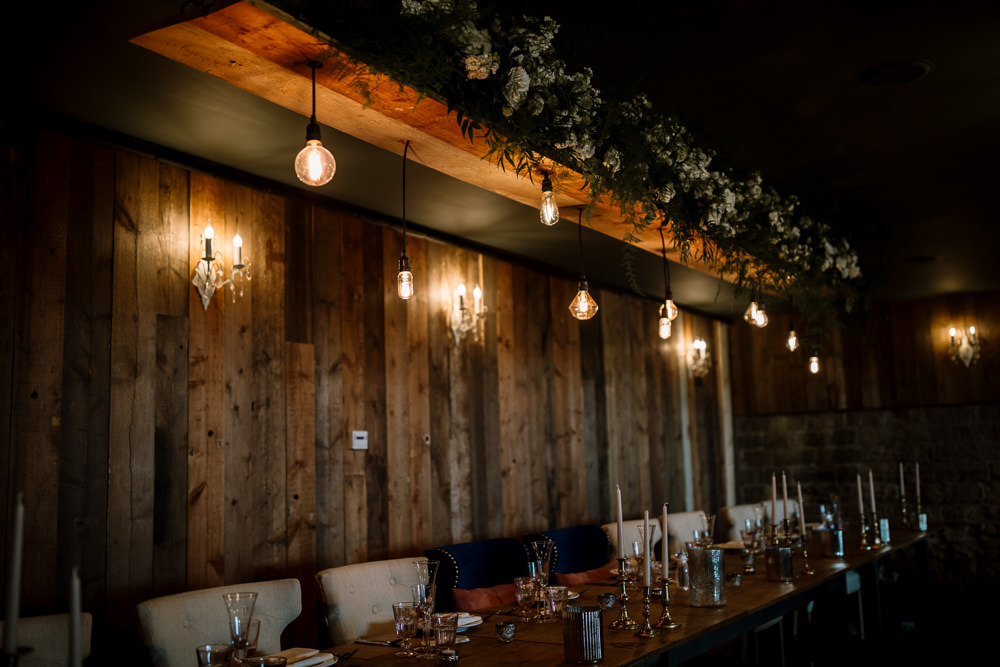 Edison Lighting Light Bulbs Flowers Greenery Foliage Decor Tables Wharfedale Grange Wedding Hayley Baxter Photography