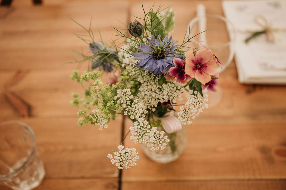 Wild Meadow Flowers Bottle Centrepice Table Celeste Marquee Wedding Sarah Longworth Photography
