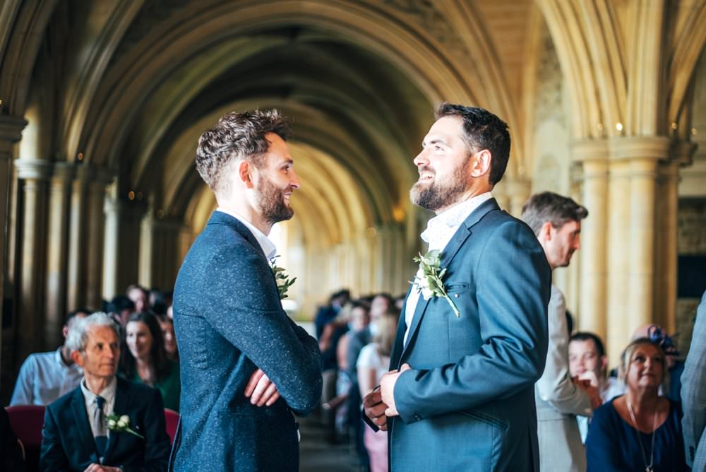 Groom Suit Blue Shirt Open Collar Chichester Hall Wedding Three Flowers Photography