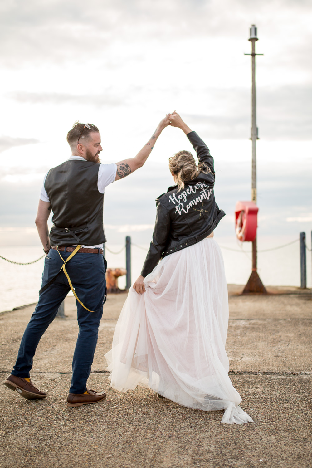 Bride Bridal Lace Cap Sleeve Separates Top Skirt Bow Tie Braces Groom Waistcoat Leather Jacket Hopeless Romantic East Quay Wedding Florence Berry Photography